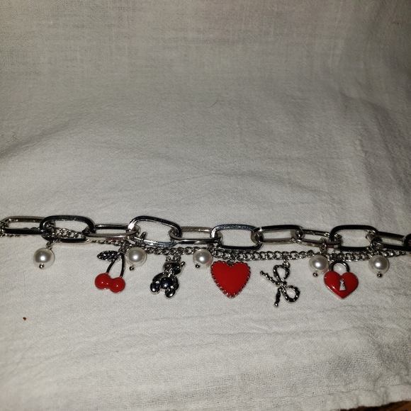 Super Cute Girlie Charm Bracelet Silvertone from our local boutique - Picture 2 of 7